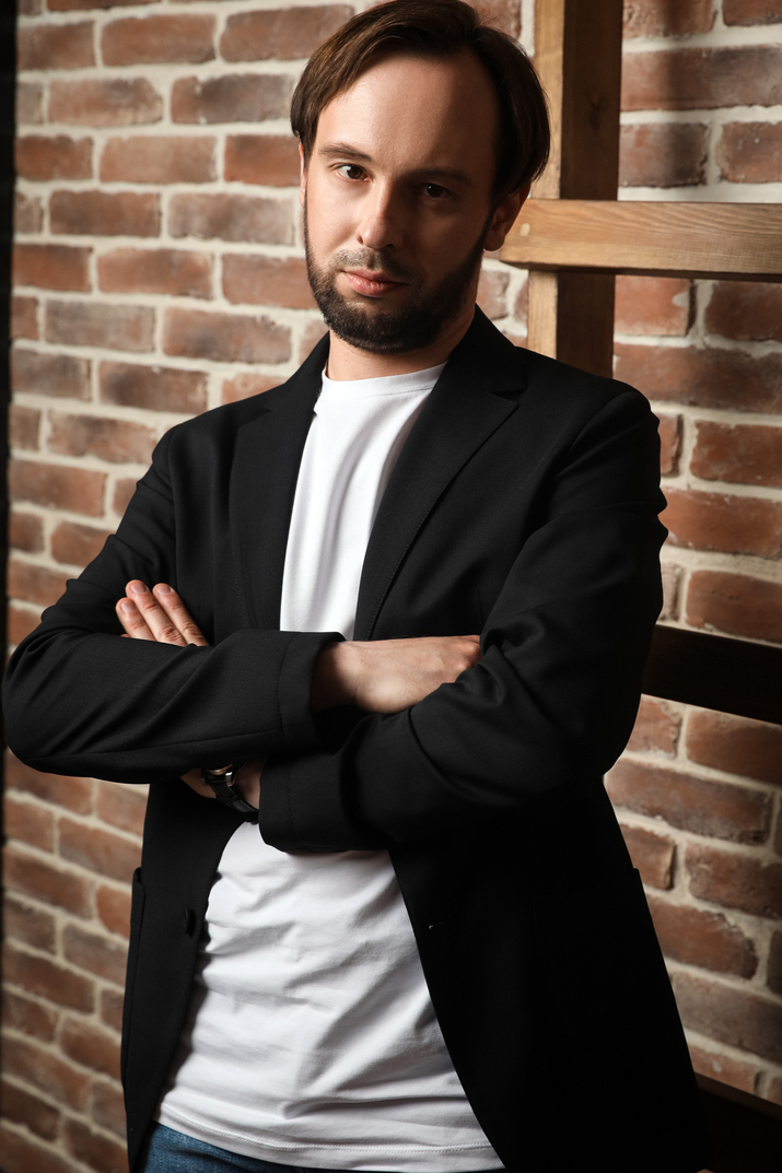 Man in black blazer and white t-shirt