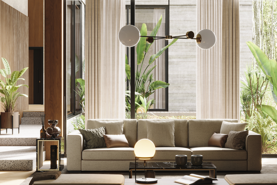 Living room with Grey Sofa and Pouf with a touch of nature and small flower pots.