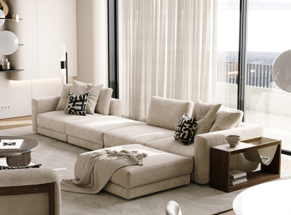 Sal�n moderno con sof� modular espacioso en tono neutro Cloud Dancer (Color Pantone 2026), iluminado por luz natural y decorado con mobiliario Laskasas.