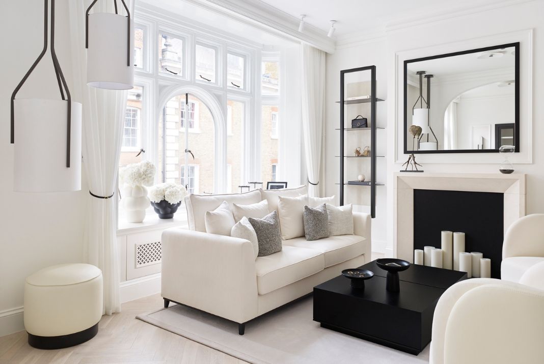A fully furnished room featuring the chic Eddy Pouf