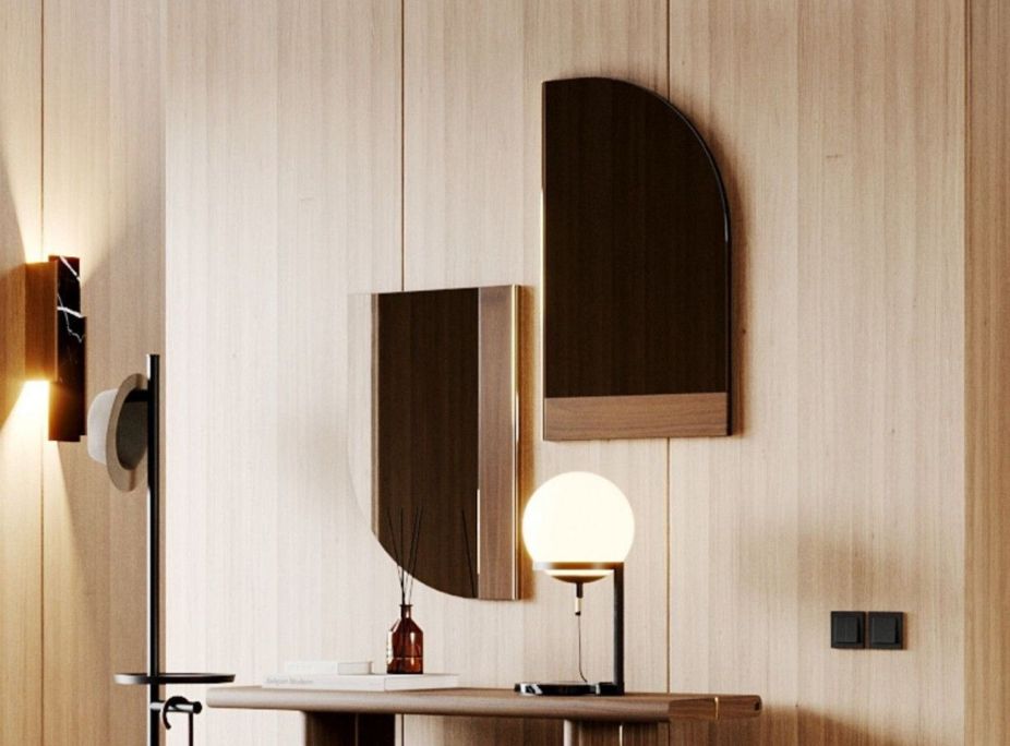 elementos como el espejo Forth, ayudan a crear un espacio más amplio y elegante en tu salón