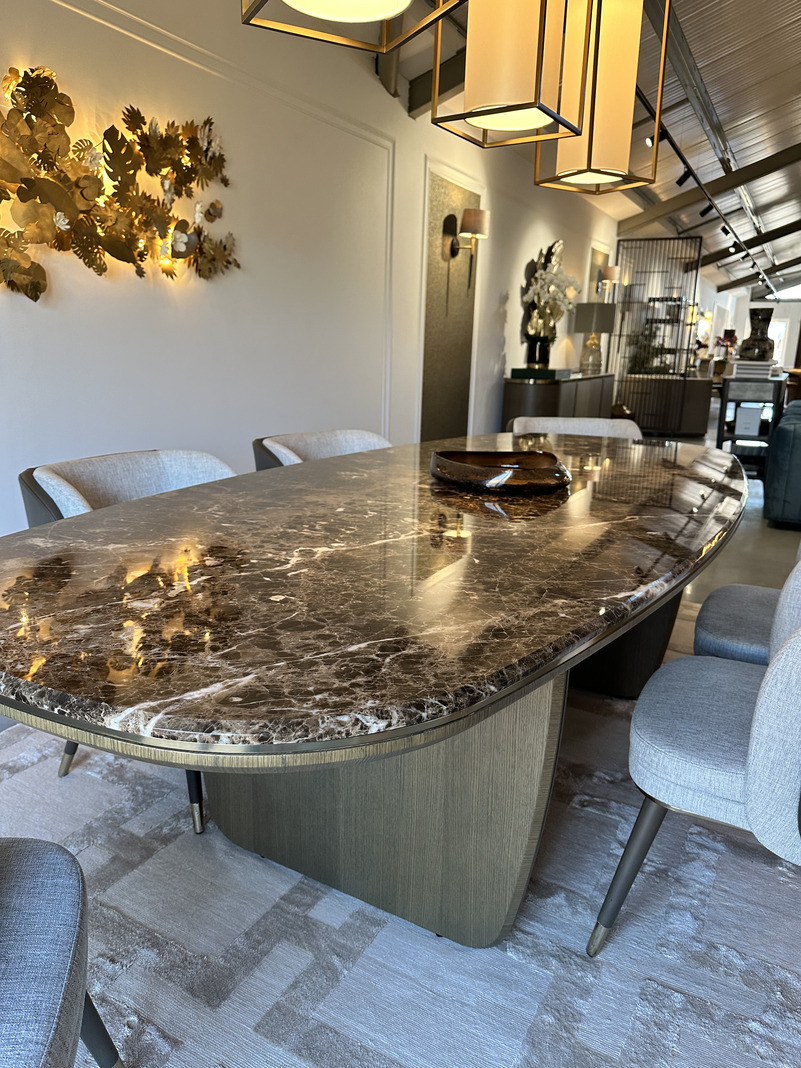 Dining area with a marble dining table and six dining chairs