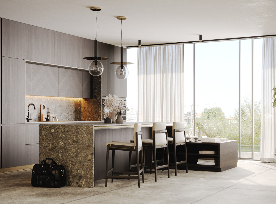 Cocina moderna con isla de piedra y dos l�mparas de techo de vidrio y metal suspendidas sobre la encimera.