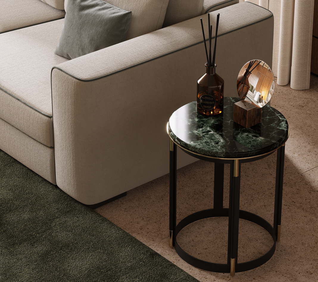 Green marble side table next to beige sofa