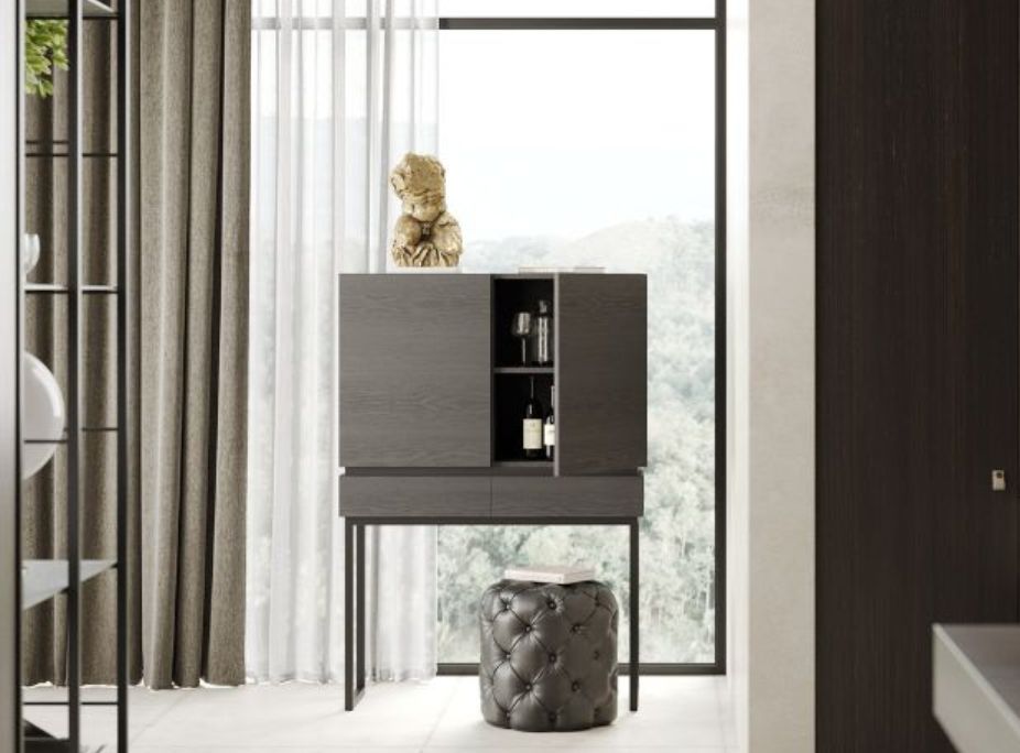 El mueble de bar Cannes es un claro ejemplo de cómo un mueble con patas altas despeja el suelo, dando una sensación de mayor espacio a tu hogar.