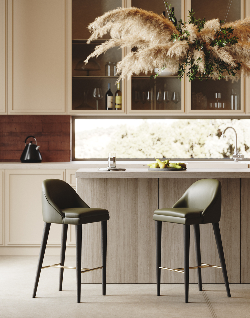 Two olive green bar stools by a kitchen counter