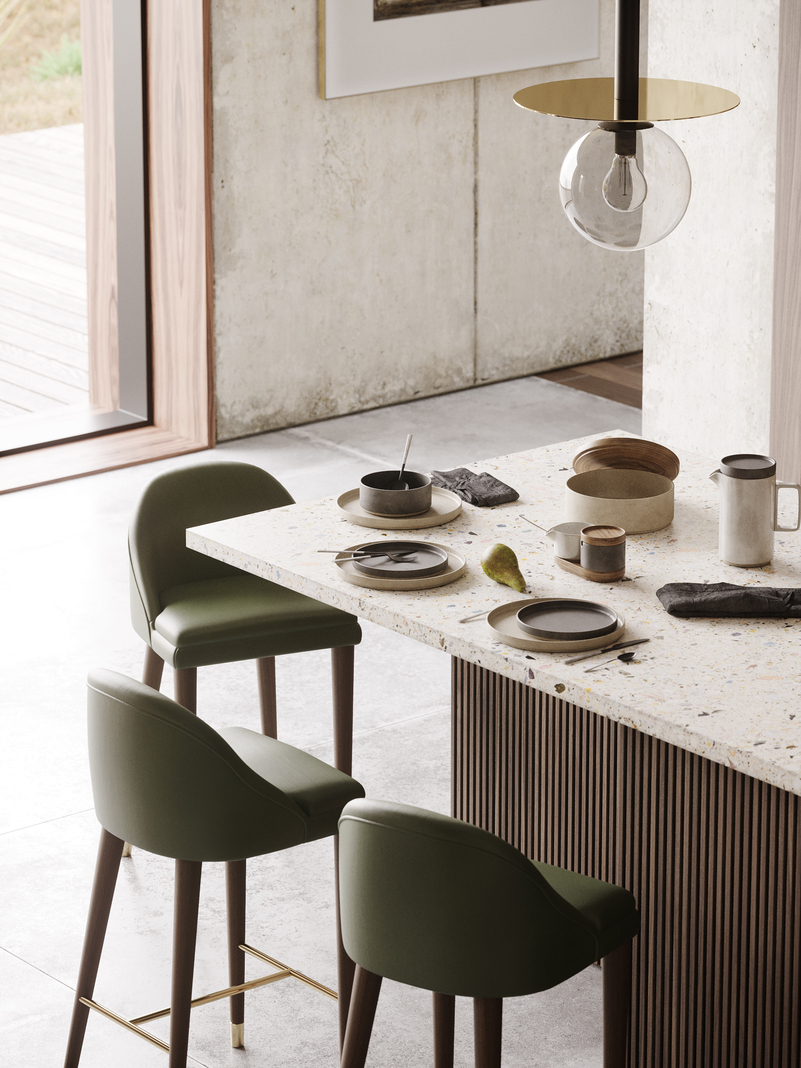 Three bar stools around a wood and marble counter