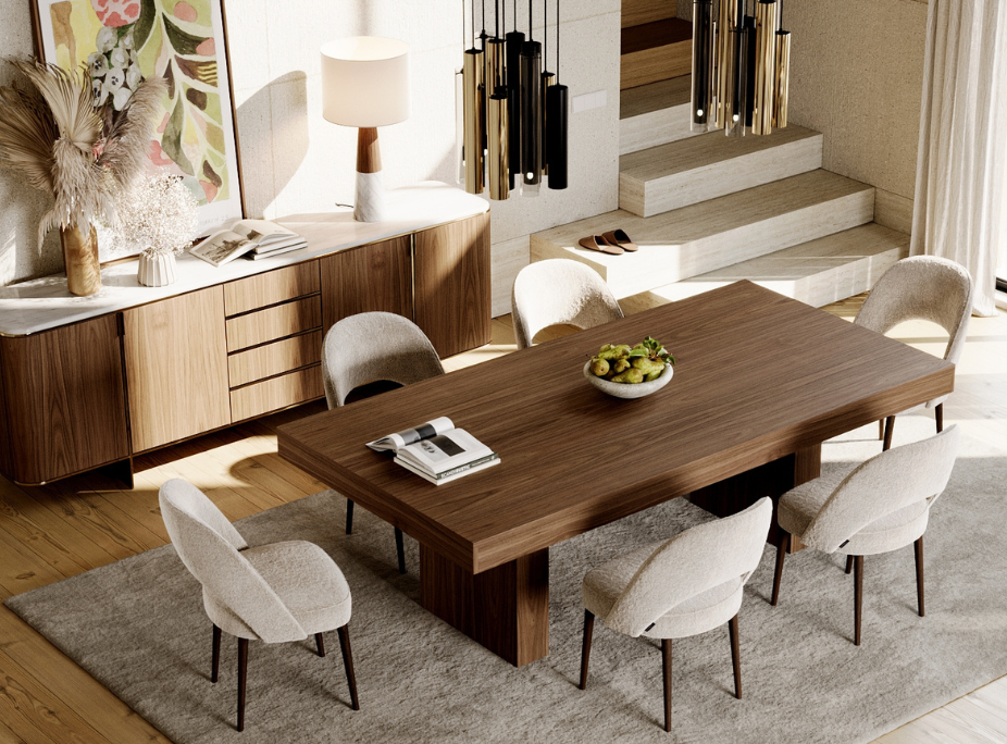 A dining room featuring a rectangular wooden table, light upholstered chairs, a sideboard with a marble top, and pendant lighting.